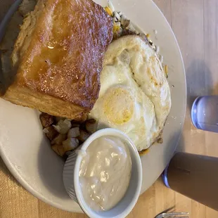 Loco Moco with honey biscuit and gravy (on a bed of  hashbrowns)