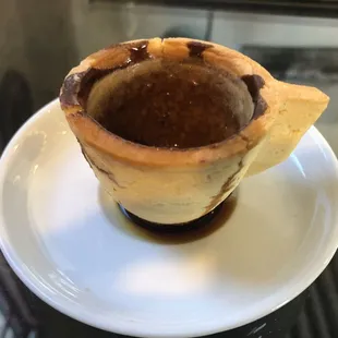Espresso in a biscottis cup