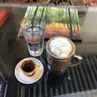 Mocha, espresso, water and owners book