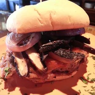 Guinness BBQ burger with homemade boxty and portobello mushrooms. Huge tasty burger!