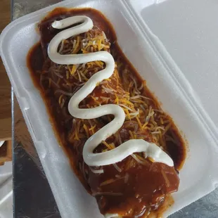 Tex-Mex Burrito smothered in Chile con carne