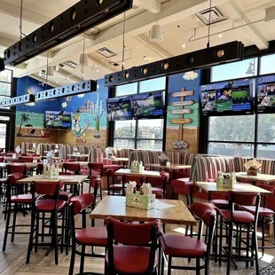 a restaurant with a large screen tv