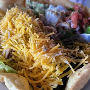 Yummy taco salad which is HUGE!