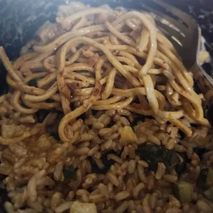 Undercooked Chow Mein noodles. The little bit of red was from my own chili oil from home.