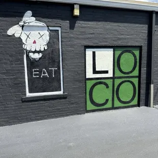 Kool logo on the wall in the back
