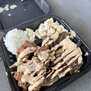 2 entrees with garlic chicken and kalbi (spicy mayo on top)