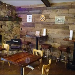 The bar area is comfortable, and features a wood-burning fireplace.