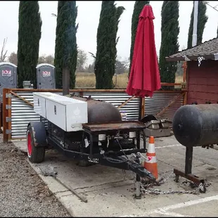 Just outside the restaurant, there are two large smokers, where the delicious barbecue happens.