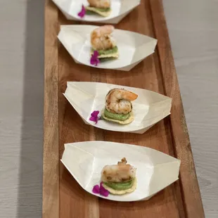 a row of plates of food