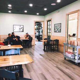 Seating area with roastery in the back.