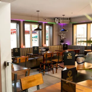 a restaurant with tables and chairs