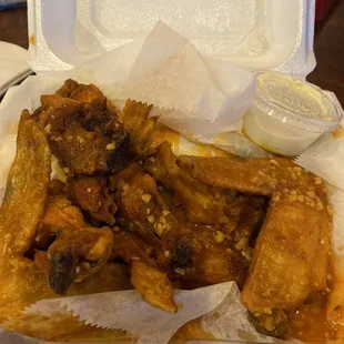 chicken wings in a styrofoam container