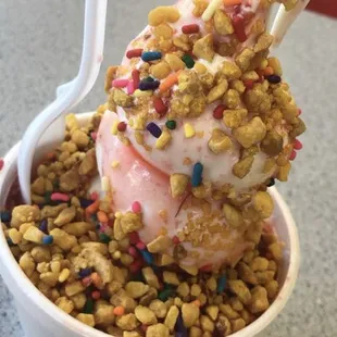a scoop of ice cream and sprinkles