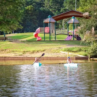 The park offers a swim area, multiple playgrounds, and paddling rentals.