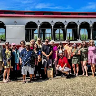 Group photo in front of the Lodi Wine Trolley at Calivines Winery and Olive Mill