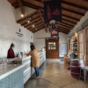 a woman standing at the counter