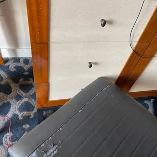 Worn down furniture. This room hasn&apos;t even been cleaned!