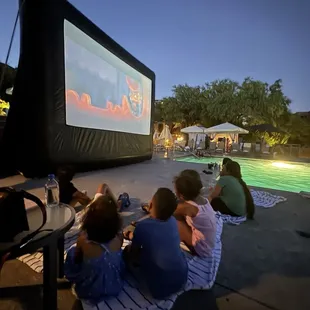 One of the activities for the weekend-- Family dive in movie night by the pool.