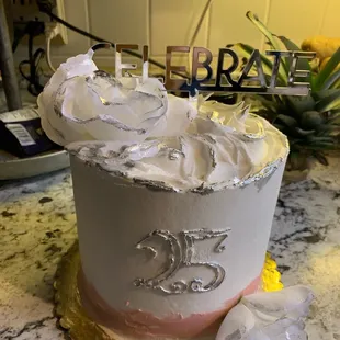 a close up of a cake with frosting