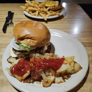Cincinnati burger and home fries and cabin burger with fries.