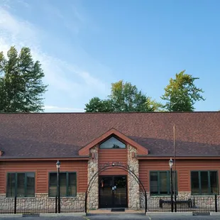 the front of a log cabin