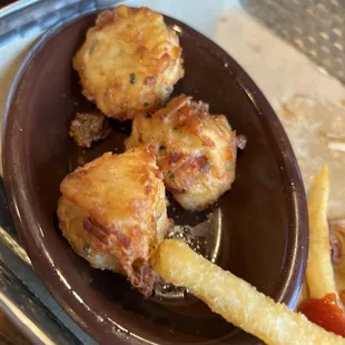 Three of the four, rich, homemade tater tots.