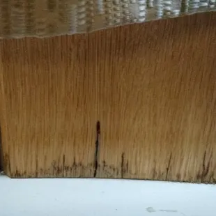 Water damage around air conditioning.  Most likely mold.