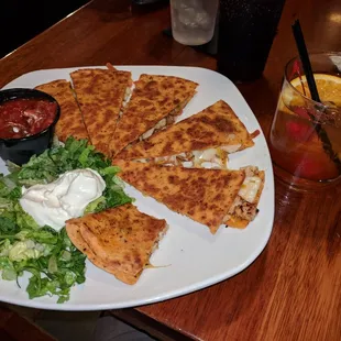 The chicken quesadilla is a hearty portion, and the salsa is flavorful and fairly spicy.