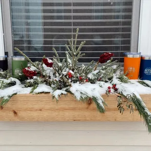 a snowy window box