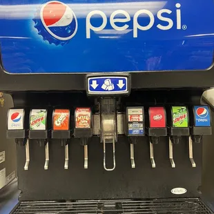 You get your own pop and tell them what you got at checkout. They have both Pepsi, and Coke