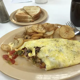 Western omelet with home fries and onions