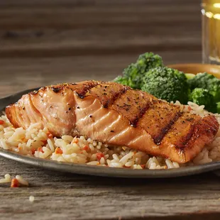 a plate of salmon and rice