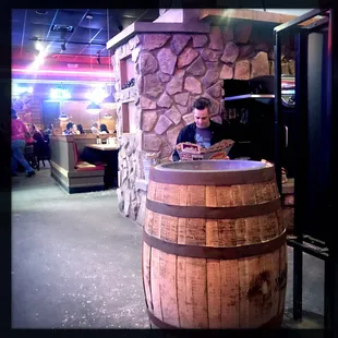 Barrel of peanuts and scoping the menu.