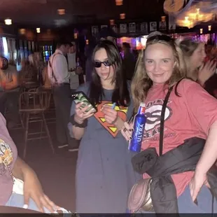 a group of people at a bar
