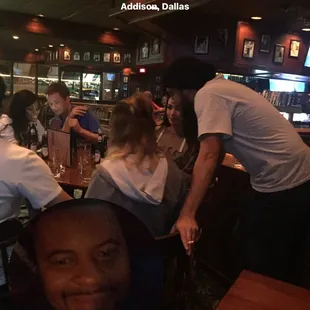 a group of people at a restaurant
