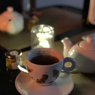 a cup of tea on a saucer