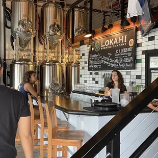 a man and a woman at a counter