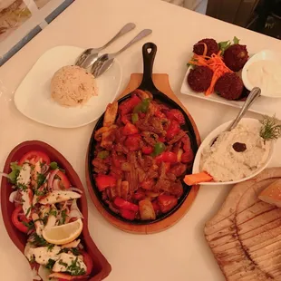 Lamb Sautee, Grilled Grilled Portuguese Octopus, Falafel and rice. Everything was delicious.
