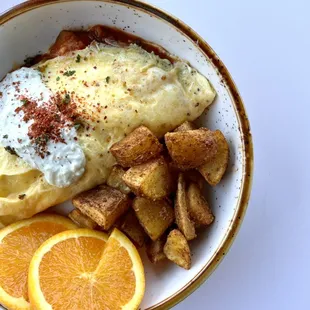 Turlu Omelet- Turkish ratatouille, tzatziki, three eggs with crispy potatoes
