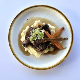 Braised Short Ribs- rainbow carrots, crimini mushrooms, mashed potatoes &amp; cipollini