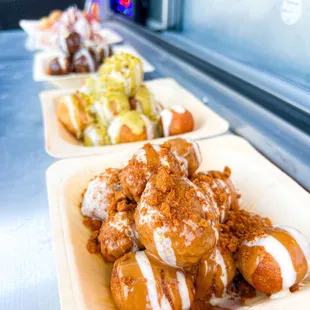 three plates of food on a counter