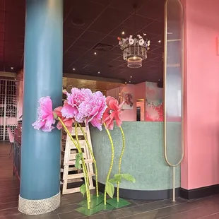 a vase of flowers in a restaurant