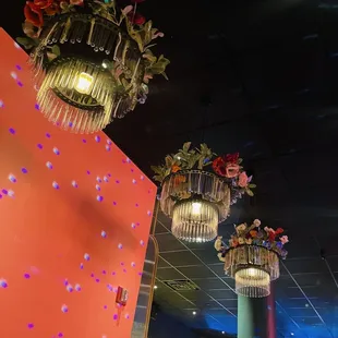 These chandelier with flowers  are stunning!