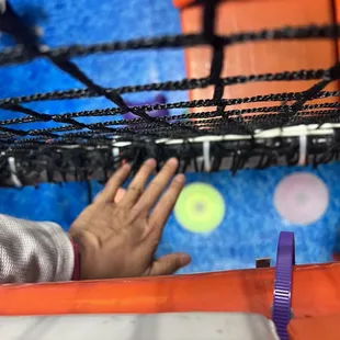 Here is the size of gap. You can see from my hand it is very wide and the purple rubber band is loose