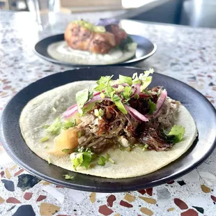 two plates of food on a table