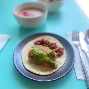 Squash Blossom Relleno and sides of rice and Lola beans