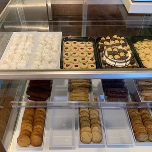 a display of cookies and pastries