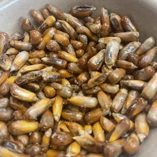 Light, crunchy and salty maize served while you take in the menu.