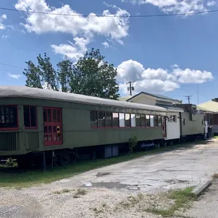Backside of restaurant! So cool it&apos;s a converted train car!
