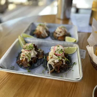 Brisket suadero and pork confit carnitas tacos